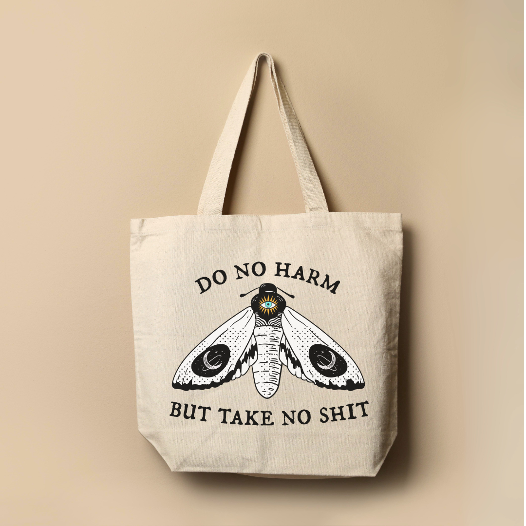 a tote bag with a picture of a moth on it