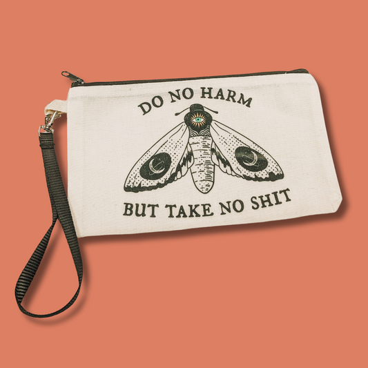 a white bag with a picture of a moth on it